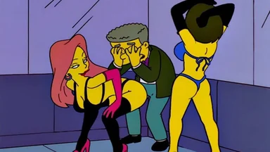 Animated screenshot of a man hiding his face in his hands while two dancers in lingerie pose beside him