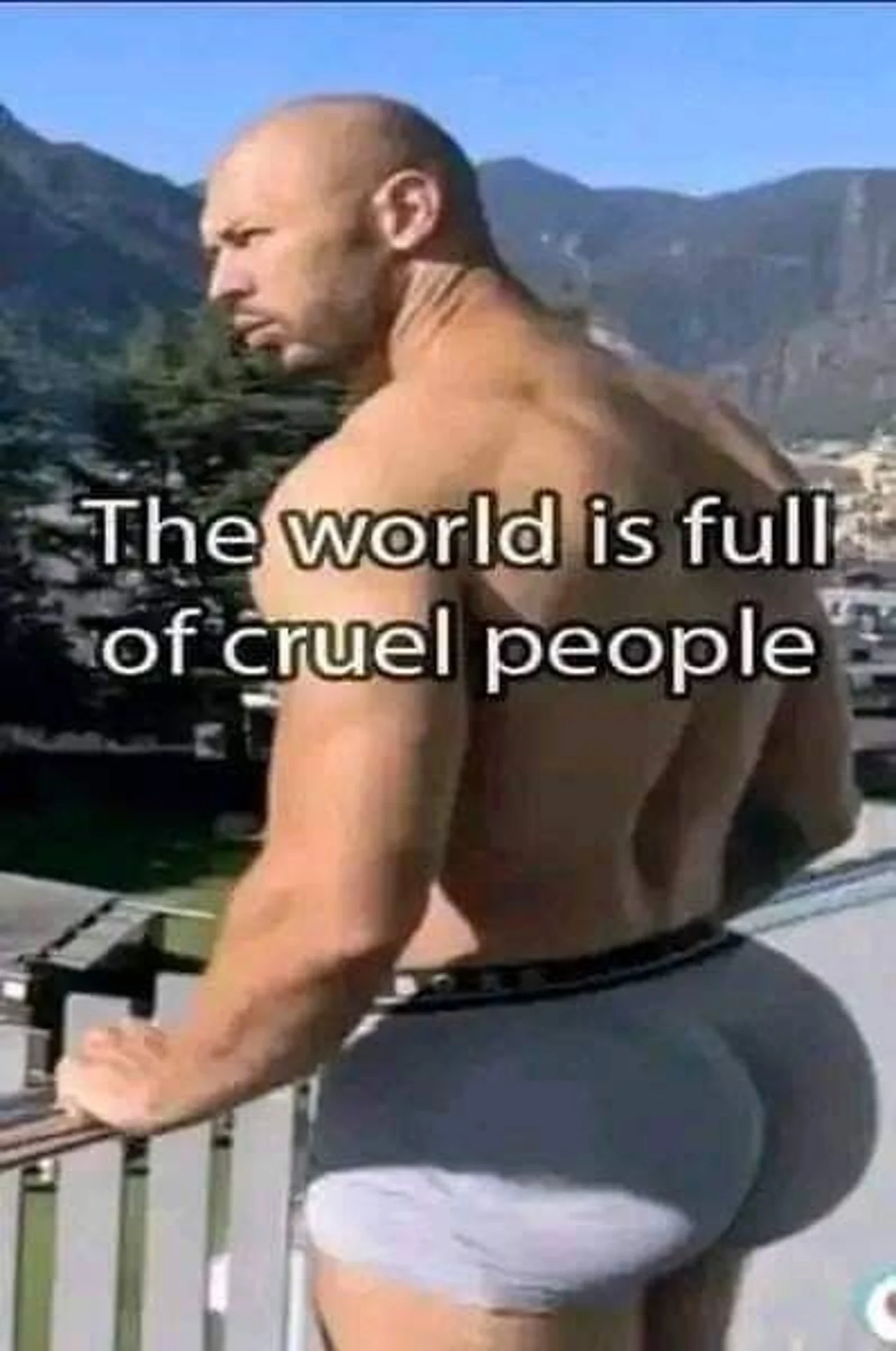 Shirtless bald man on a balcony seen from behind with caption 'The world is full of cruel people'